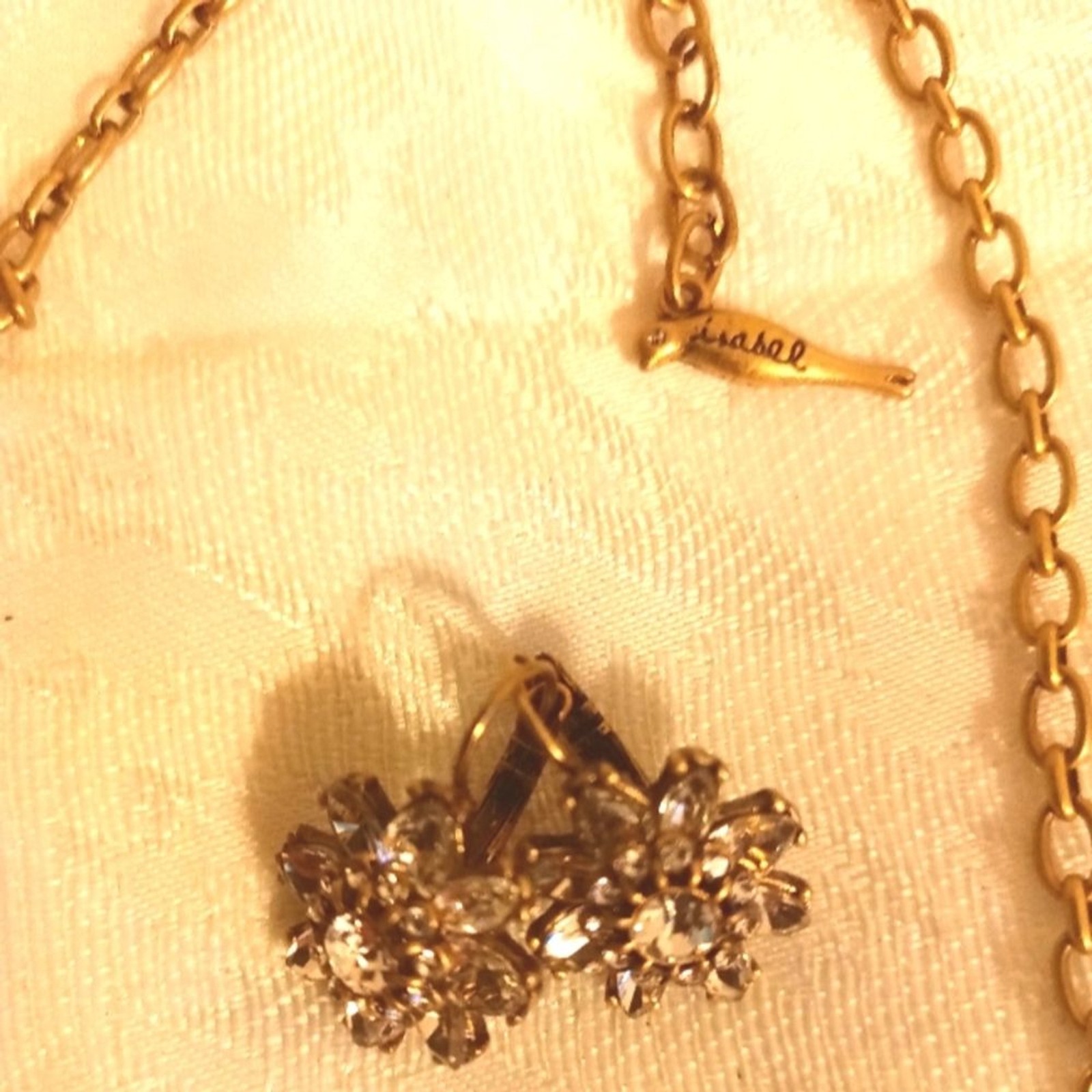 Chloe+Isabel flower rhinestone necklace and earring set. Antique gold