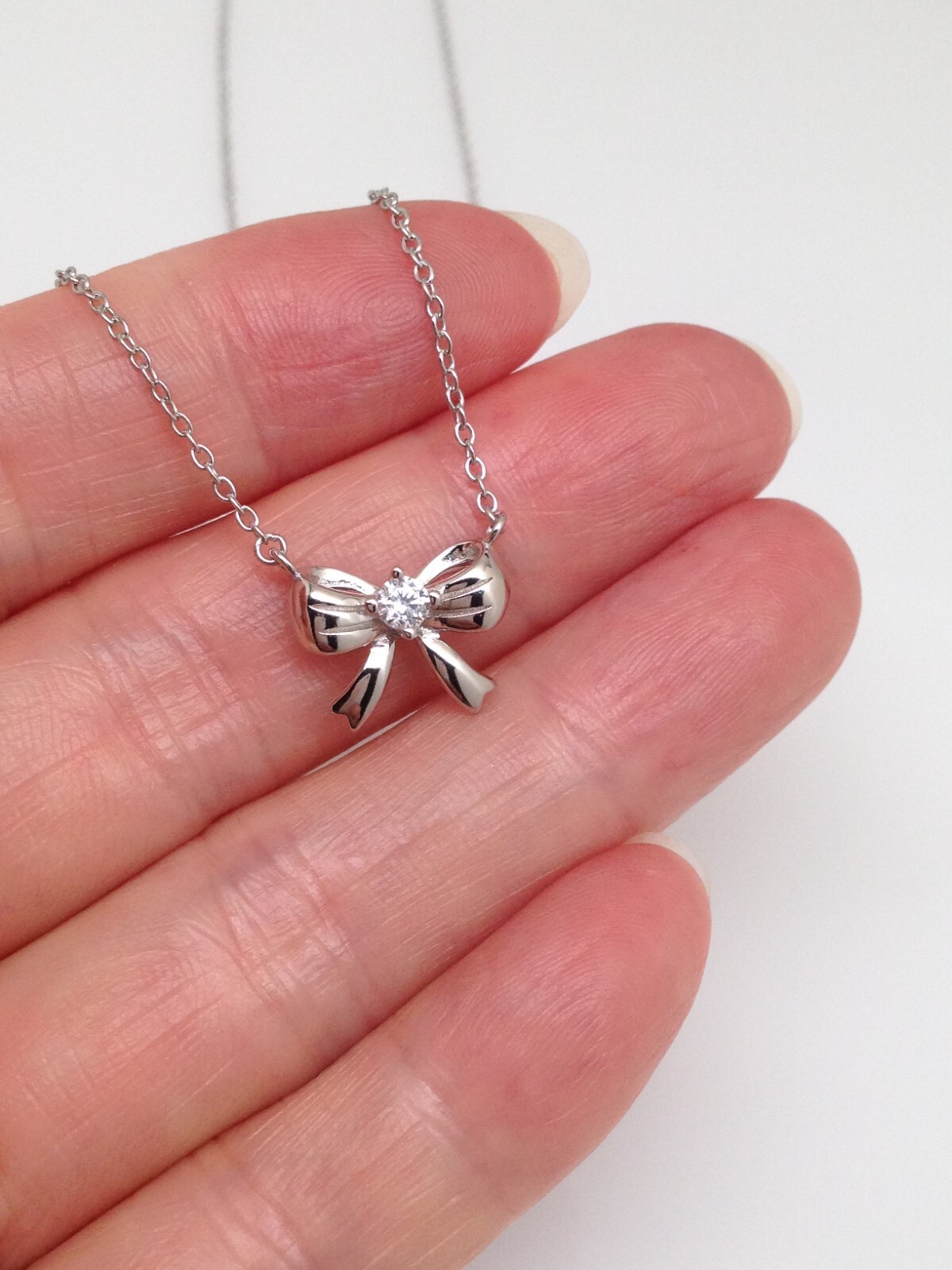 Silver Bow Pendant Necklace Sterling Silver 925 CZ Tiny 12mm 15.25-17.25″