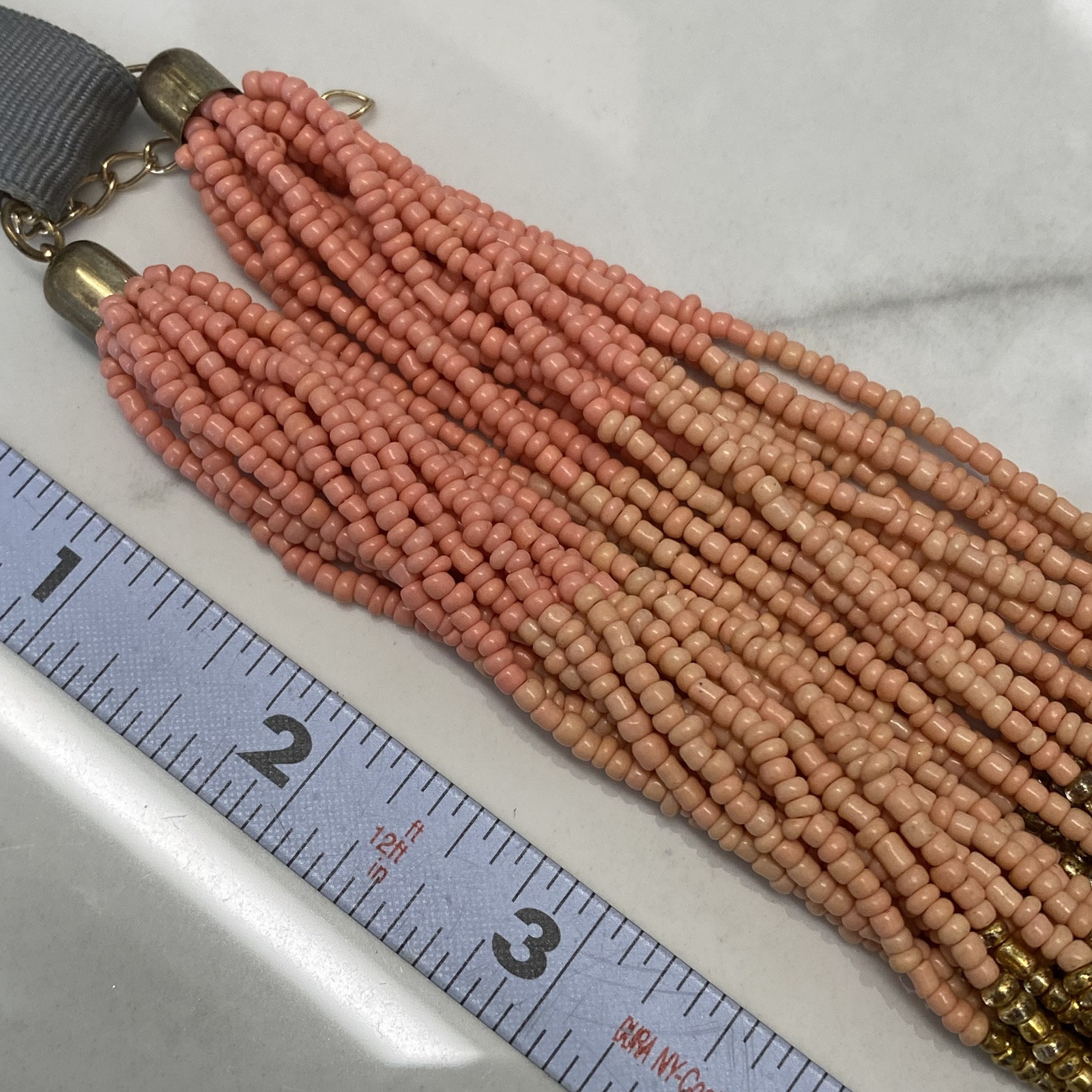 New Seed Bead Necklace by Anthropologie salmon pink gold NWT $38. Multi Strand