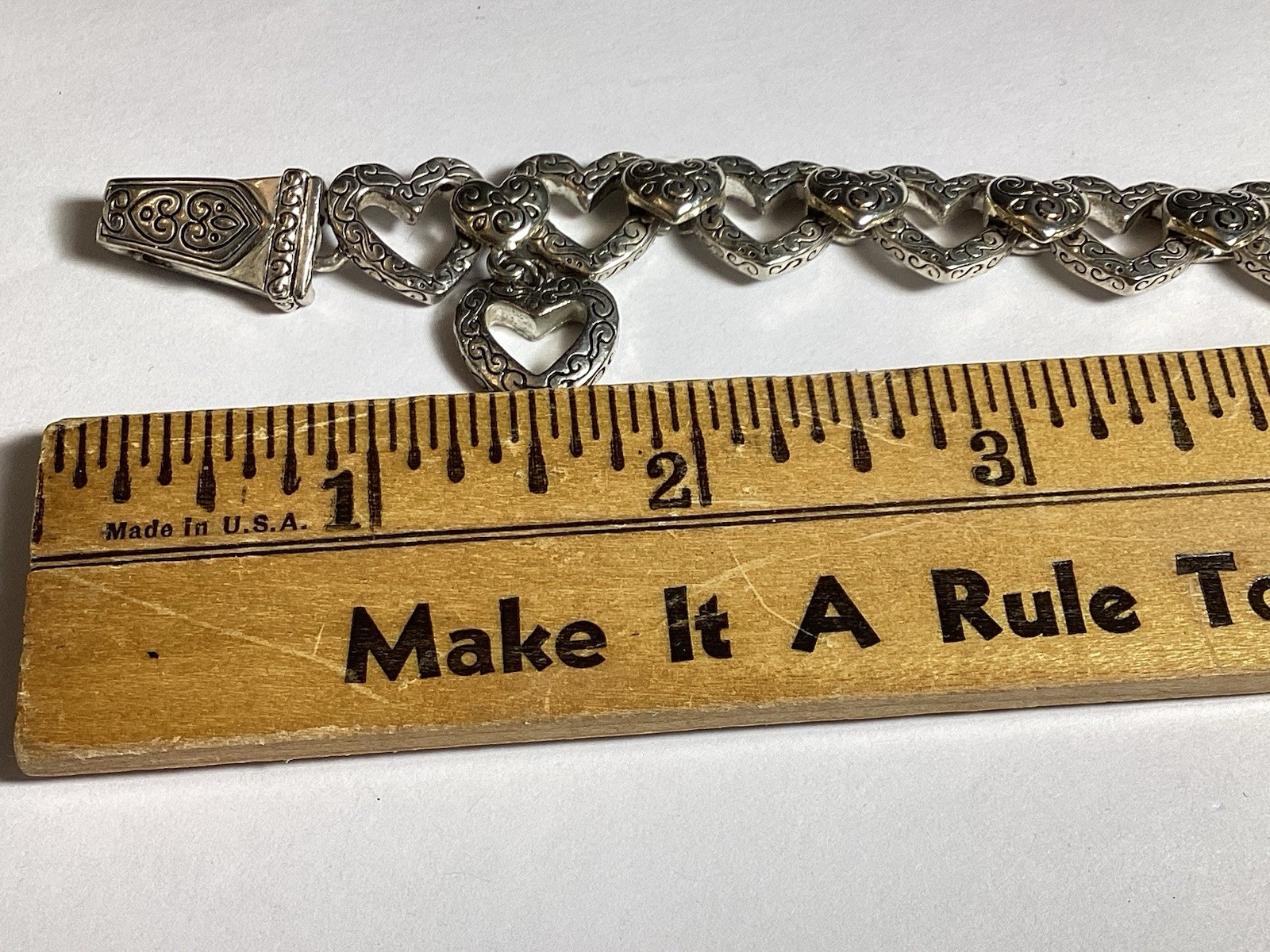7 3/4” FANCY HEARTS BRACELET WITH DANGLE HEART FOLD OVER MAGNETIC CLASP