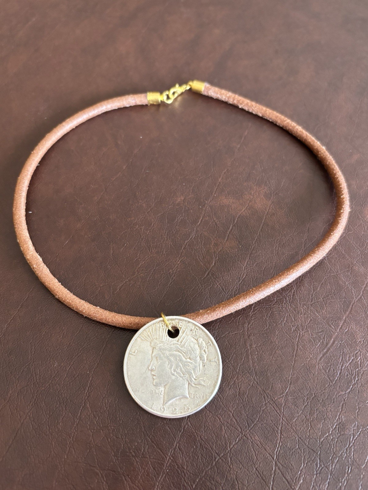 101 Year Old Silver Peace Dollar on a Thick Leather Cord