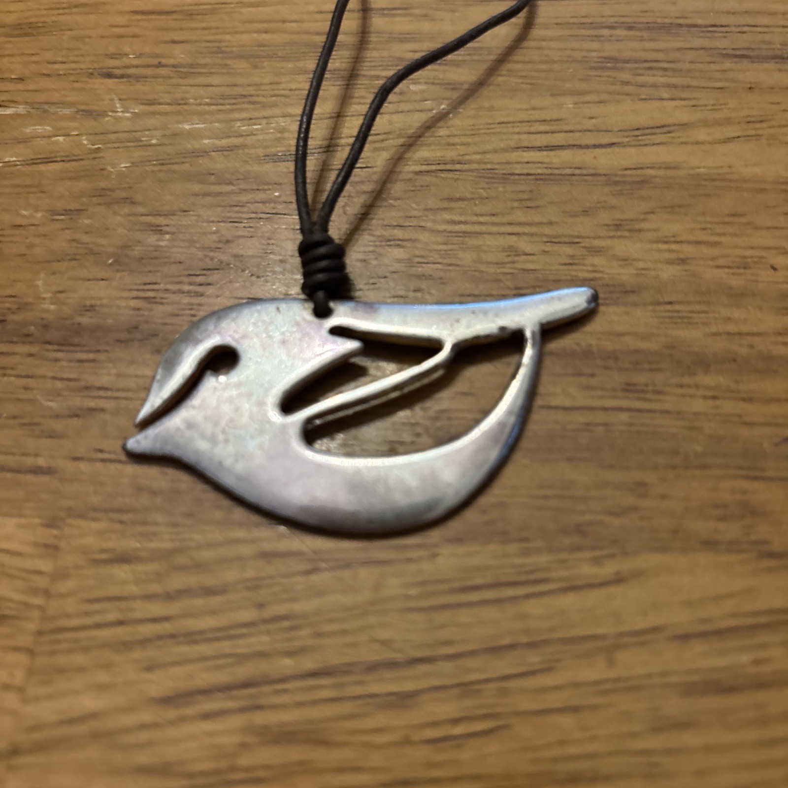 Fossil Silver Bird on brown leather cord – 16” Necklace w/ 2” extender