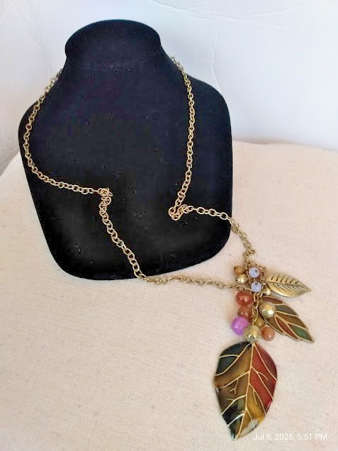 Earth Tone Colored Pendant Necklace with a Leaf Design and Dangling Beads