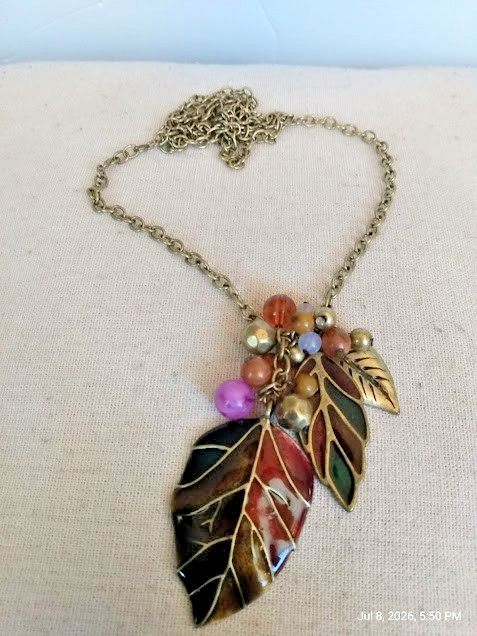 Earth Tone Colored Pendant Necklace with a Leaf Design and Dangling Beads