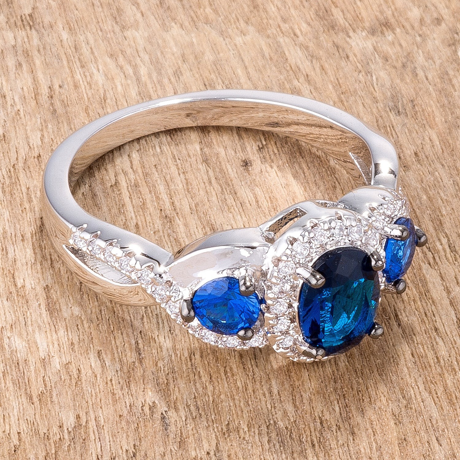 1.43Ct Rhodium & Hematite Plated Sapphire Blue & Clear CZ Three Stone Twisted Ri