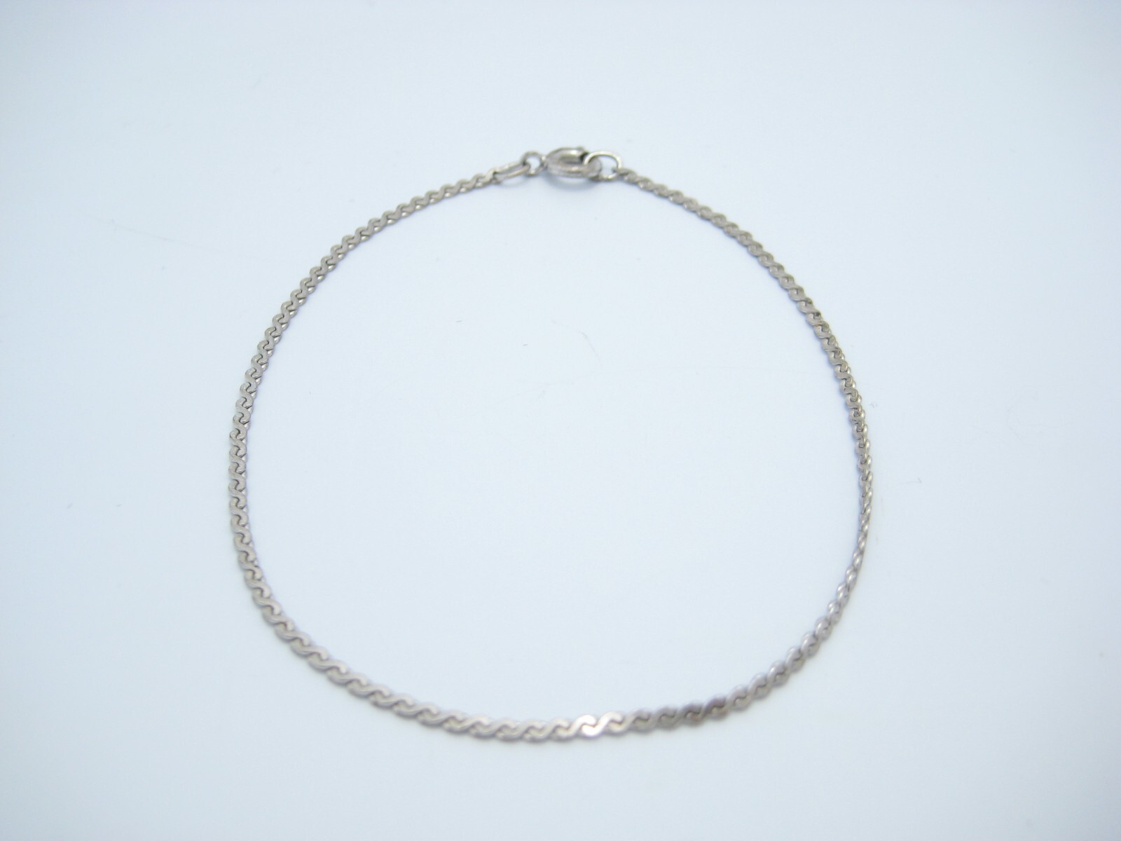 Sterling Silver Flat Serpentine Chain Link 0.5mm Bracelet 7″