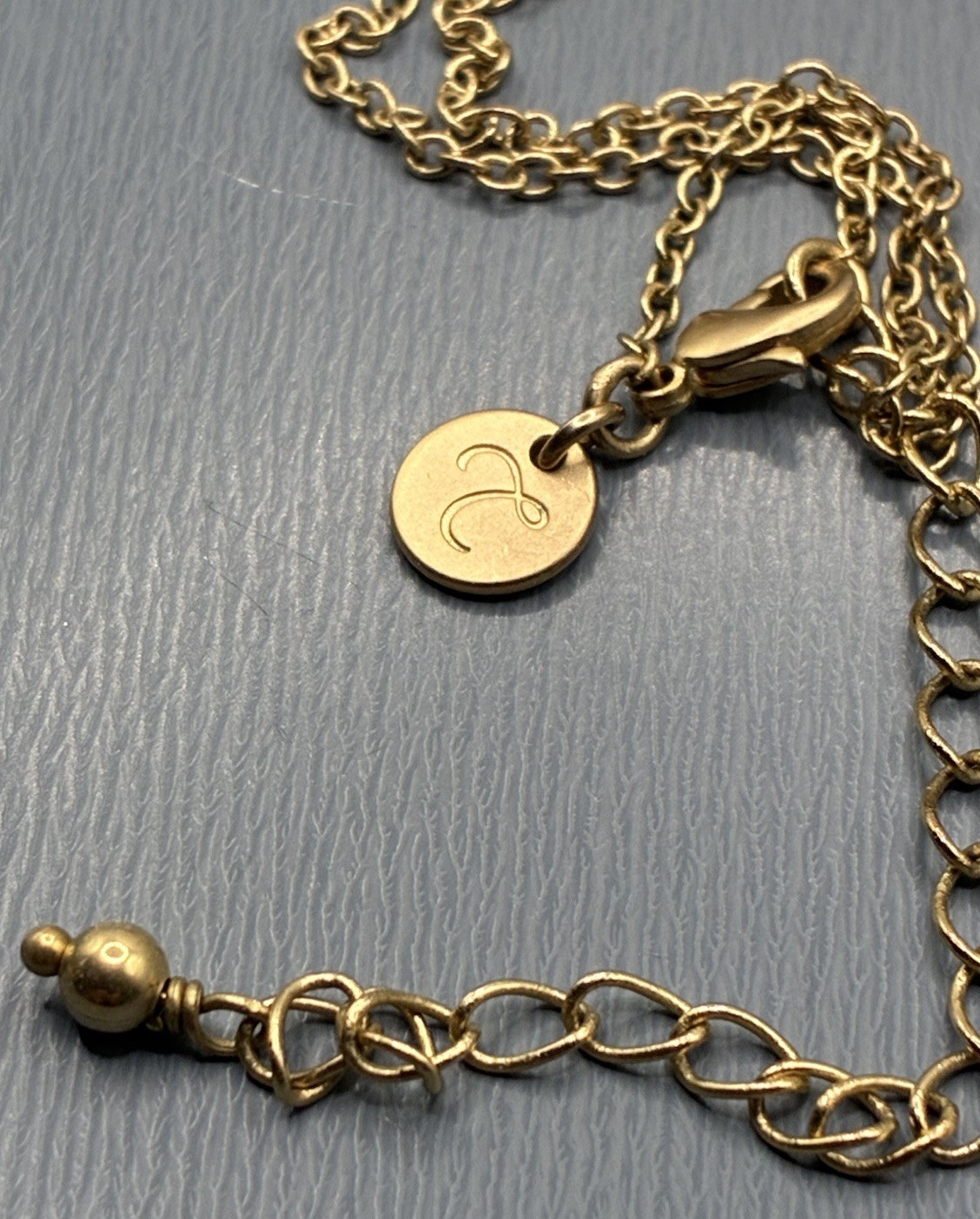 Touchstone Light Sapphire, Briolette, Swarovski Crystal Gold Tone Necklace