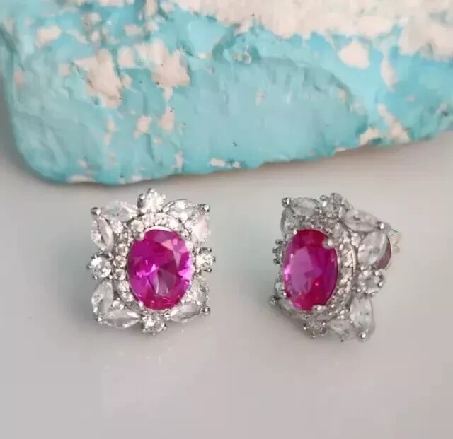 Oval Cut Simulated Pink Sapphire Women’s Stud Earrings In 14k White Gold Plated