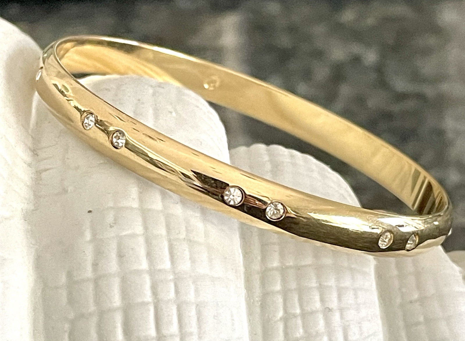 Swarovski Gold Tone Bangle Bracelet with Scattered Crystal Accents Swan Logo