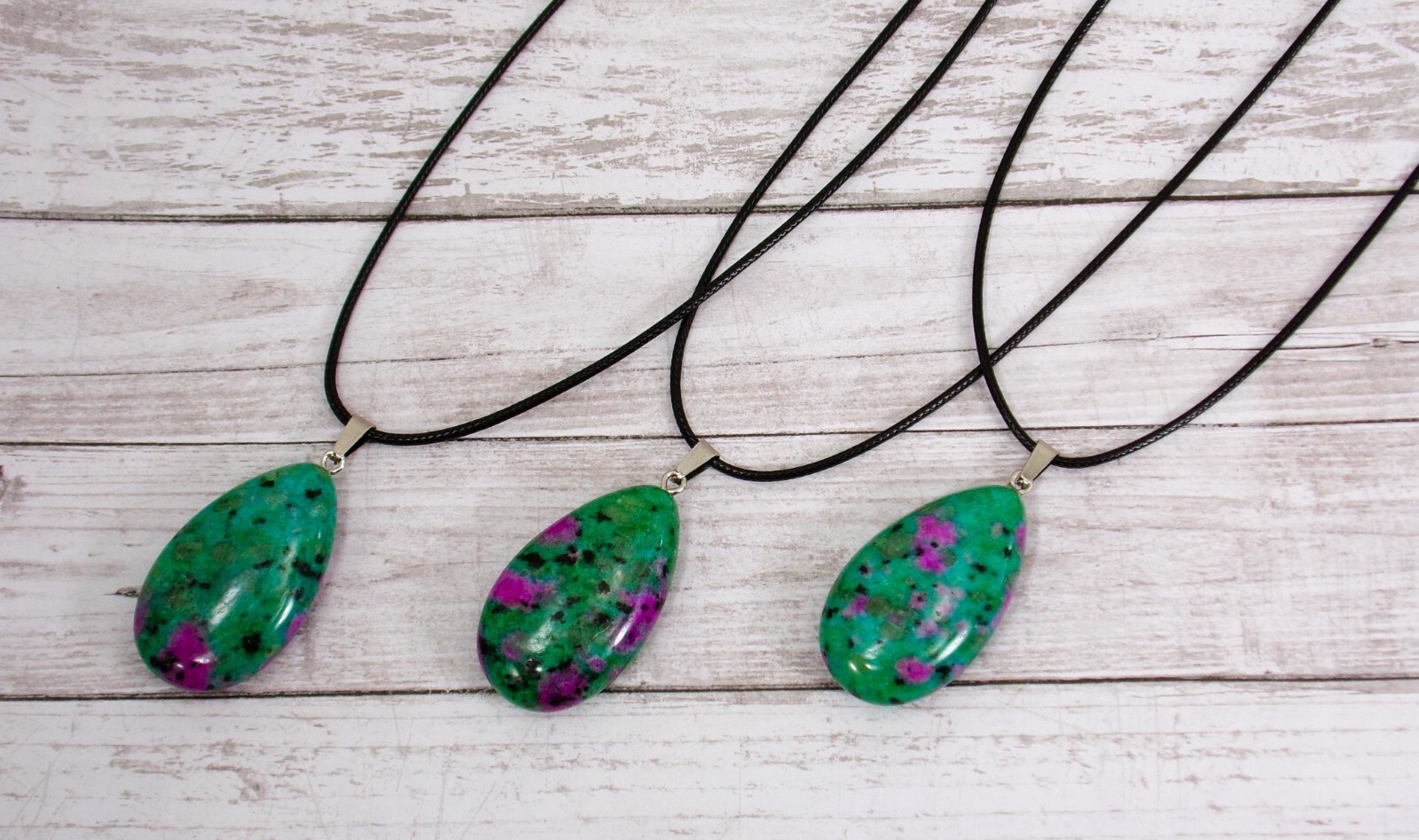 Natural ruby in zoisite teardrop stone pendant necklace on black cord New