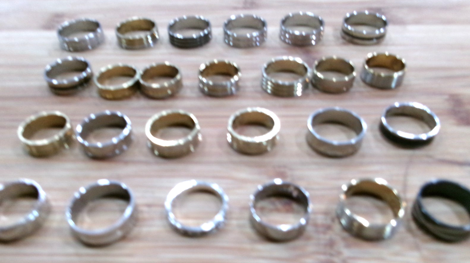 Lot of 24 Band Style Rings-Goldtone/Silvertone/Black Sizes 7-11
