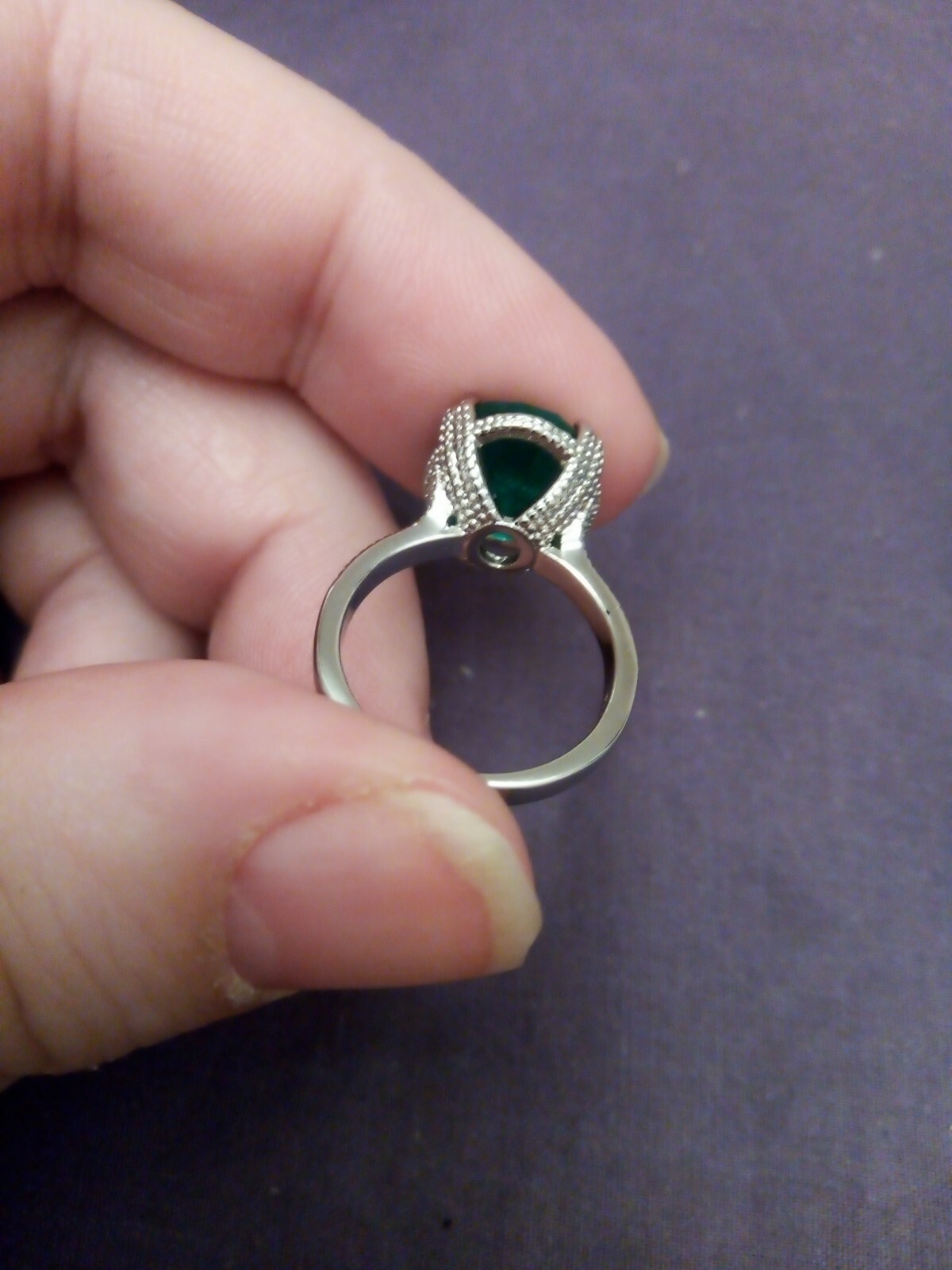 SizeUK J and USA 4.5 Possibly silver ring Green oval cut claw set ring