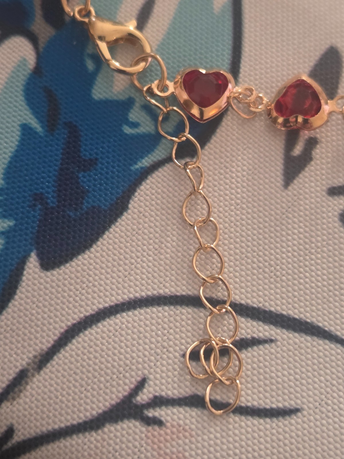 Ruby heart chain bracelet 7 inches long, lobster clasp and 2 inch extender