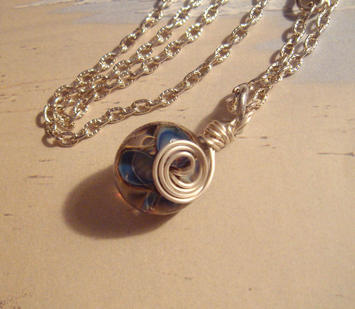 #76 Blue Clear Mix Lamp Work Bead Pendant with Silver Chain Wire Wrapped