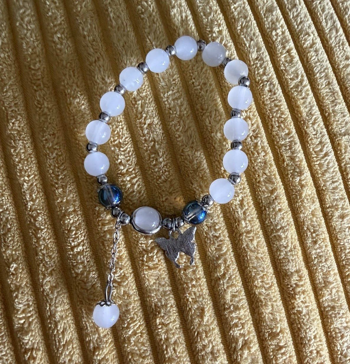 White glass Beaded Stretch Slip-On Bracelet with Silver Tone Dangle Charm