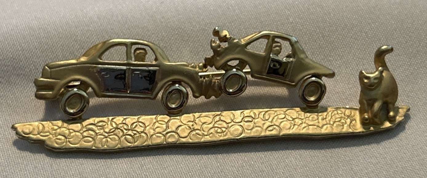 AJC PIN OF A CAT CAUSING A CAR CRASH ACCIDENT 2 5/8 INCHES LONG