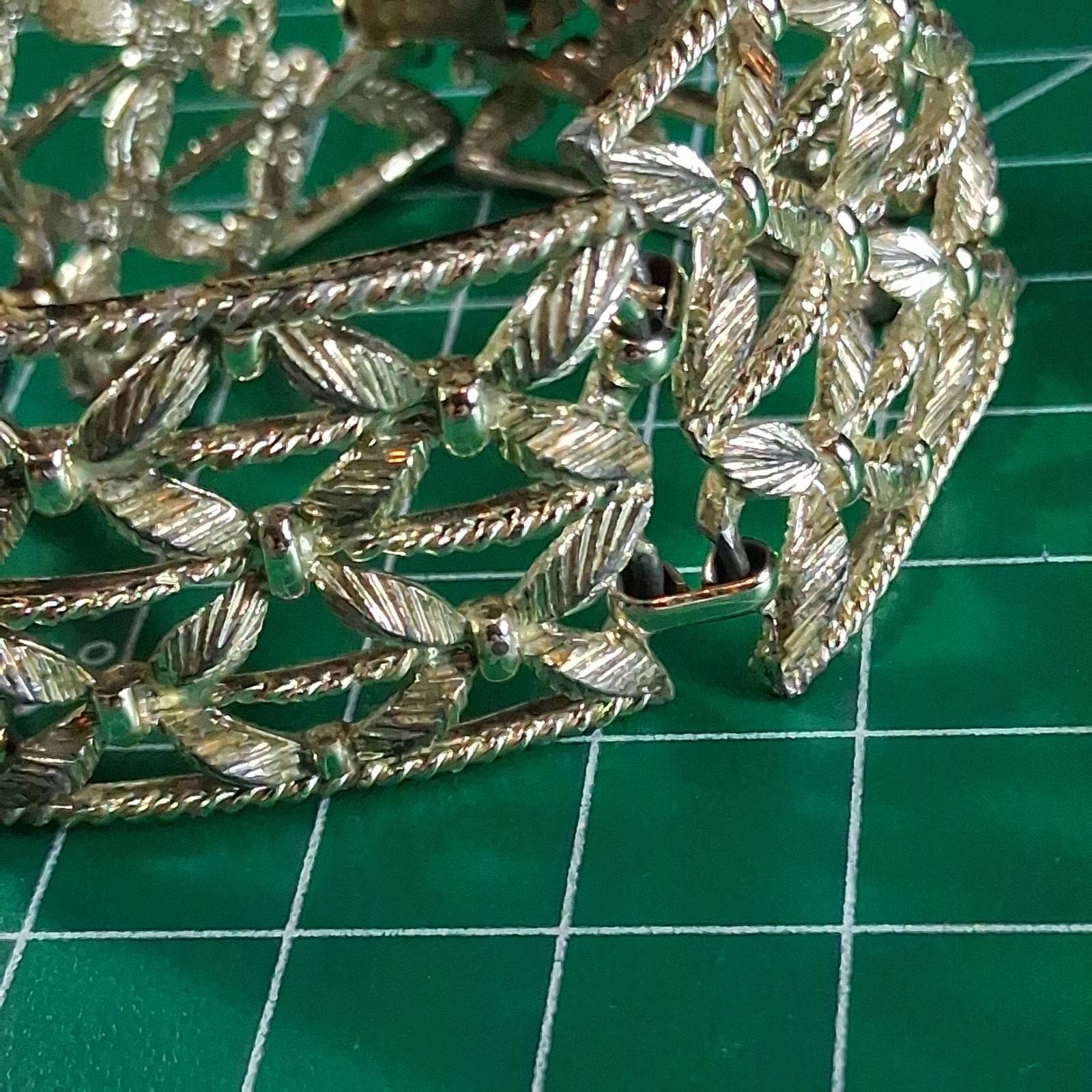 Vintage Cora Silver Tone Wide Band Floral Design Fold Over Clasp Bracelet