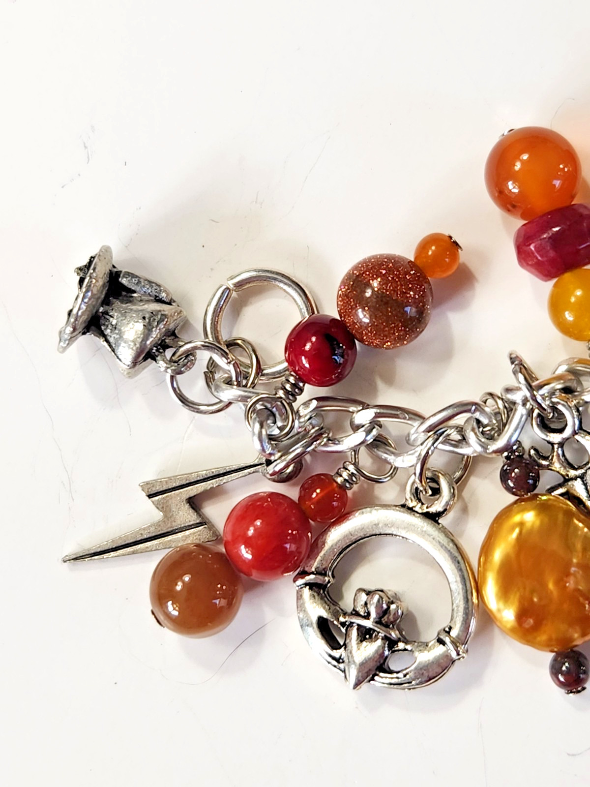 Silvertone Bracelet Multiple Dangle Charms Stone/Glass Beads Sword Lion Wolf