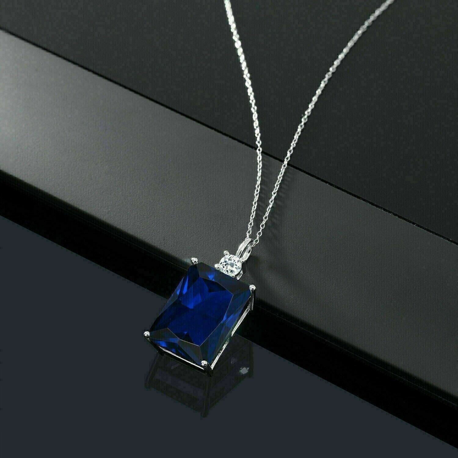4.00Ct Emerald Cut Simulated Sapphire Lovely Charm Pendant 14K White Gold Plated
