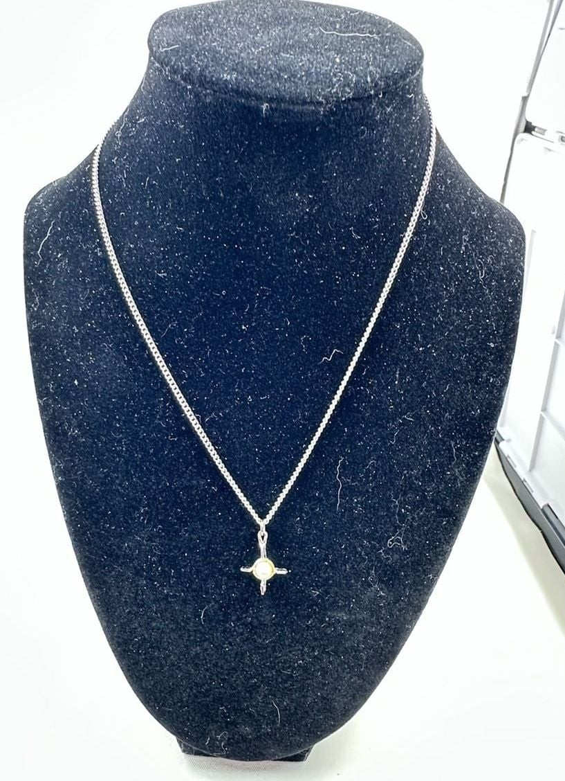 Silver-Tone Starburst Pendant Necklace with Faux Pearl