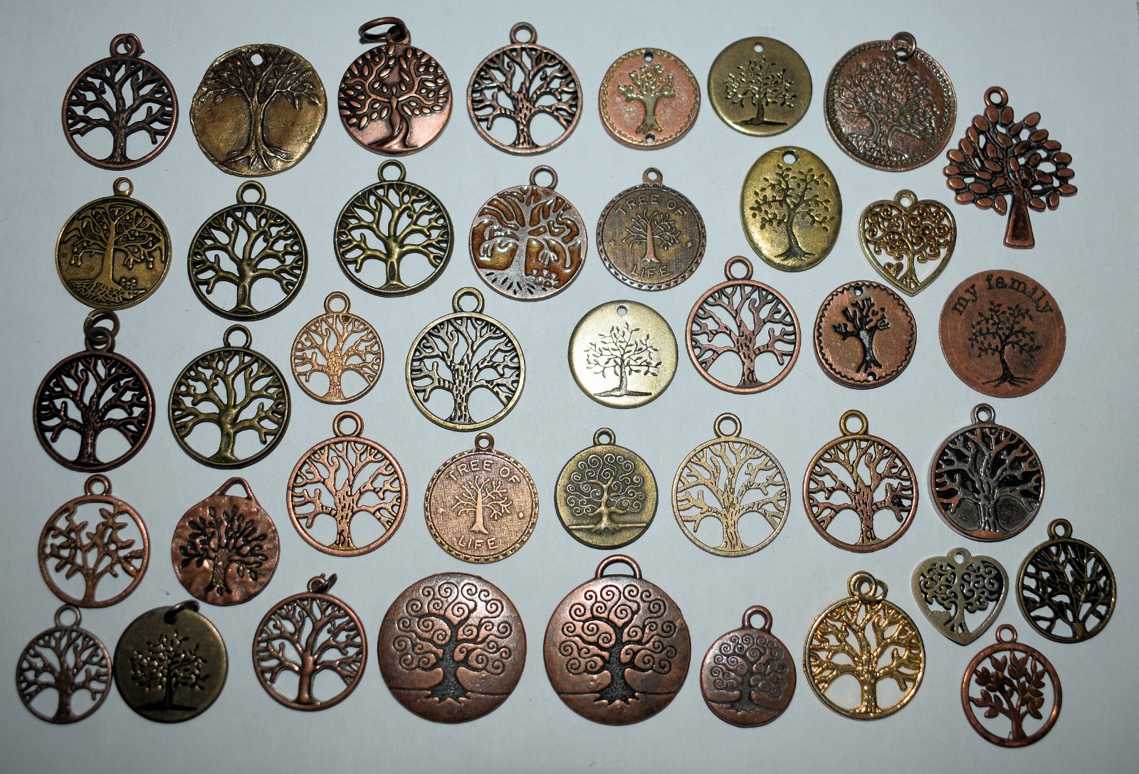 133f. 41 x JEWELRY NOVELTY “TREE OF LIFE” SYMBOLS COPPER, BRASS PENDANTS 1/4-1″