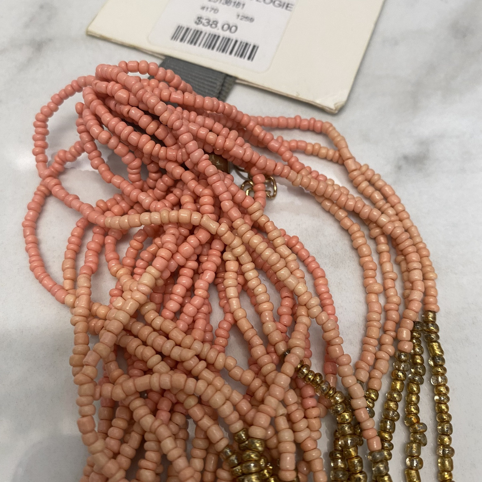 New Seed Bead Necklace by Anthropologie salmon pink gold NWT $38. Multi Strand
