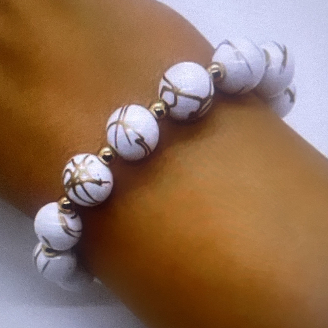 White Round Stone Beaded Stretch Bracelet No Clasp with Gold Tone