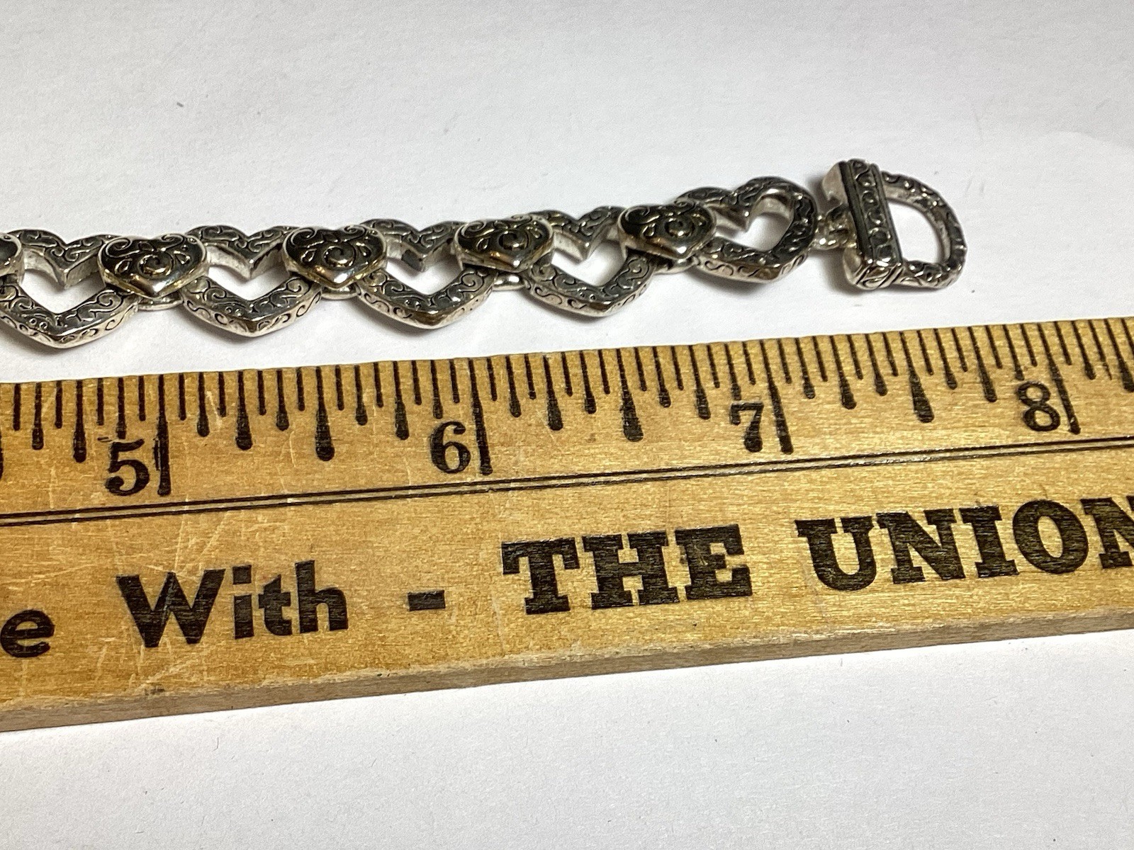 7 3/4” FANCY HEARTS BRACELET WITH DANGLE HEART FOLD OVER MAGNETIC CLASP