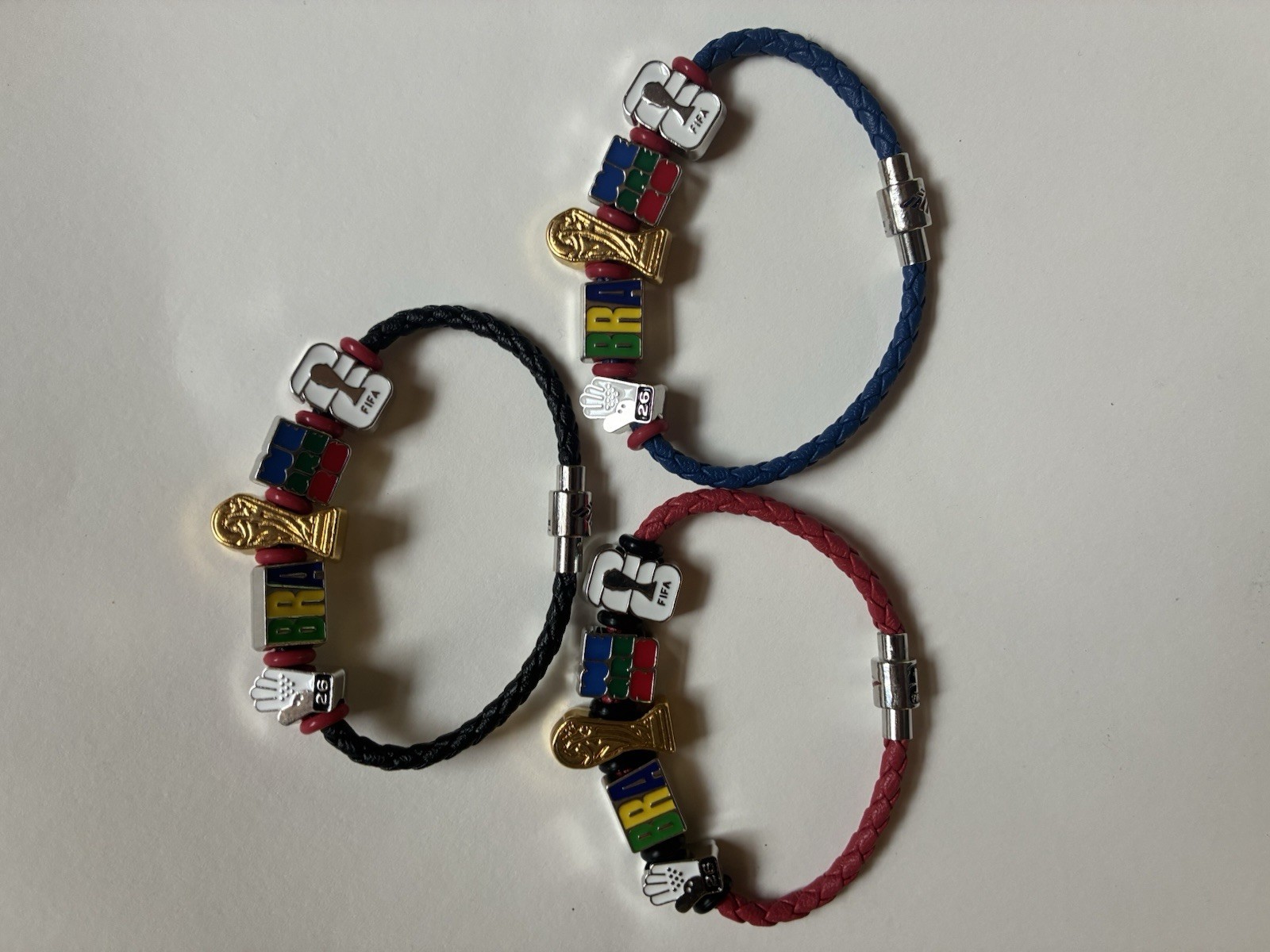 BofA FIFA Brazil red, black, and blue large 9 1/2”and small 7 1/2”. 15 in stock