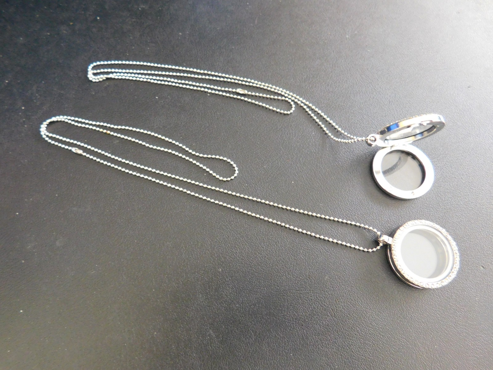 MAGNETIC SILVER LOCKETS W/CIRCLE OF GEMSTONES & CHAIN – 2 FOR $65.00