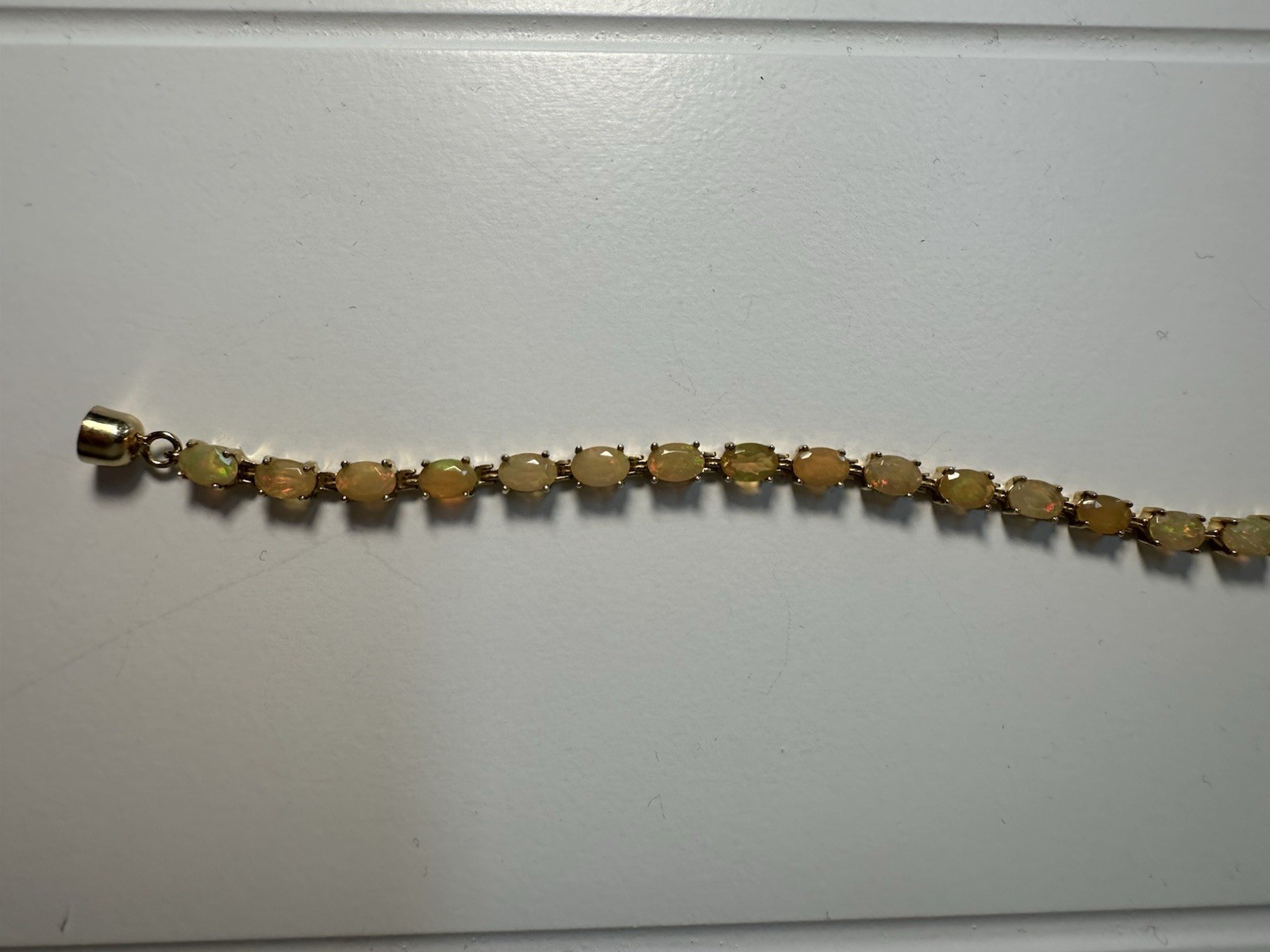 Gold-Tone Tennis Bracelet Yellow Opalite Oval Stone 6.75in magnetic clasp