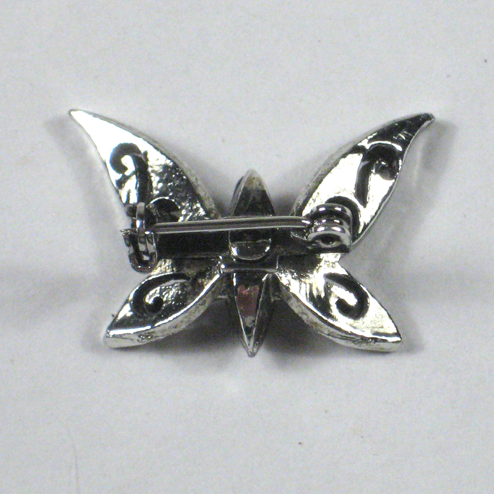 Butterfly Brooch Silvertone Unsigned Pin 1 x 1 1/8 Inches Filigree Pin