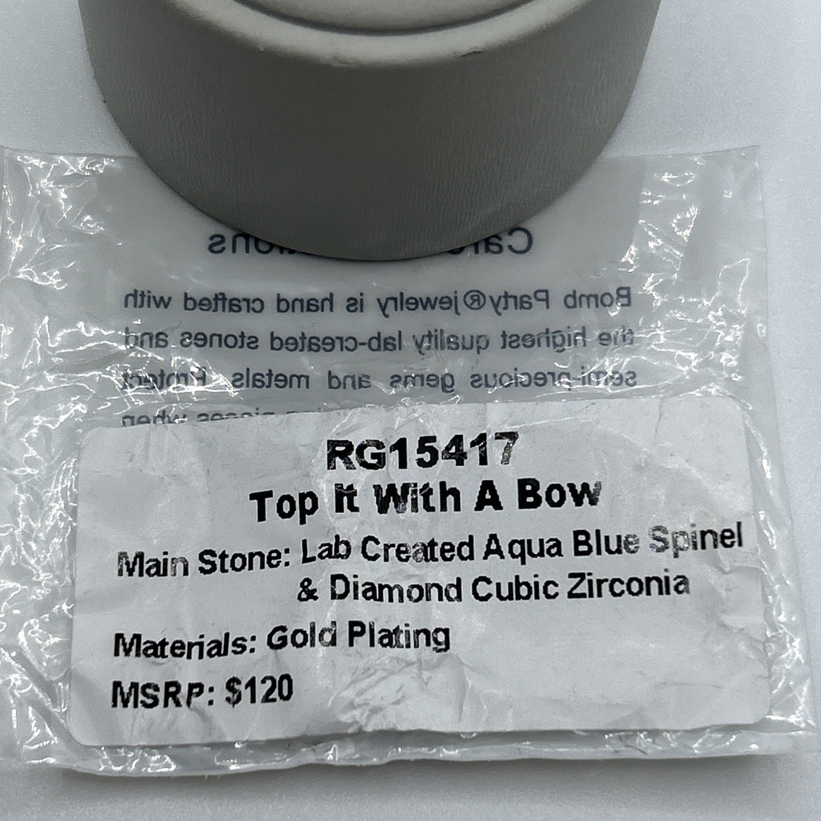 Bomb Party Bow Ring Sz 7 “Top It With A Bow” Aqua Blue Spinel on Gold