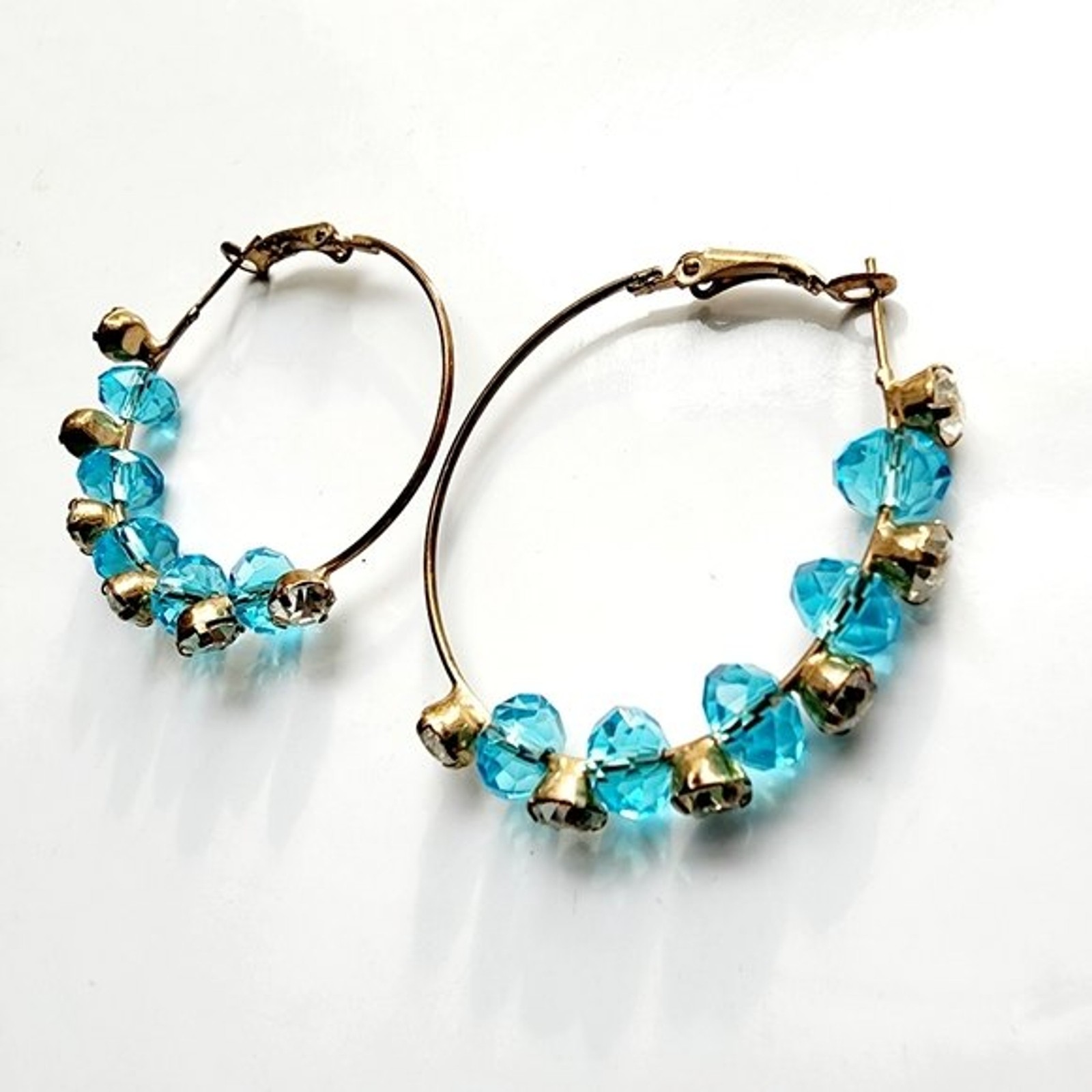 Large Bohemian wire rhinestone station hoops with brilliant blue stones