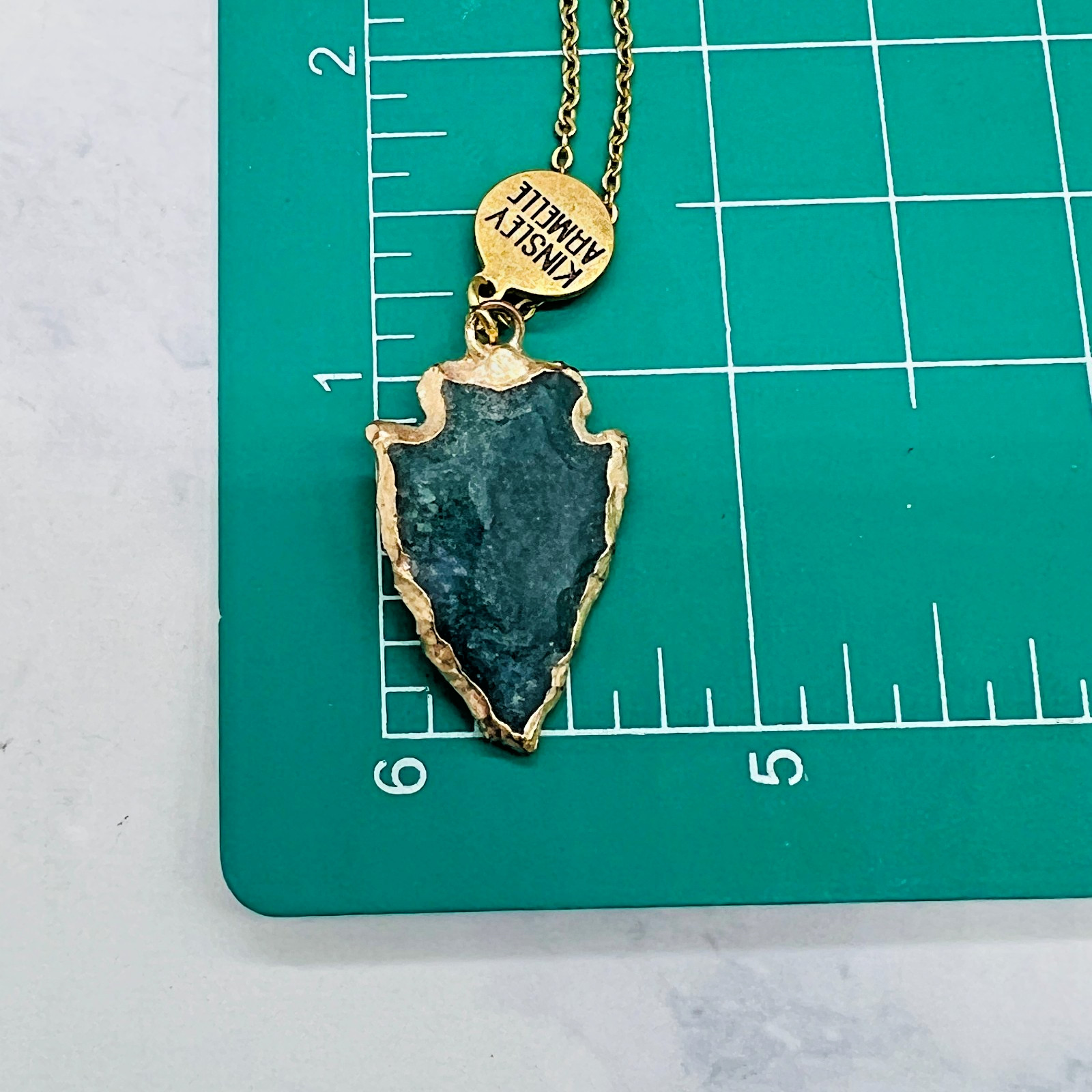 Kinsley Armelle Gold Toned Volcanic Rock Arrowhead Pendant Necklace w/ Box 16″