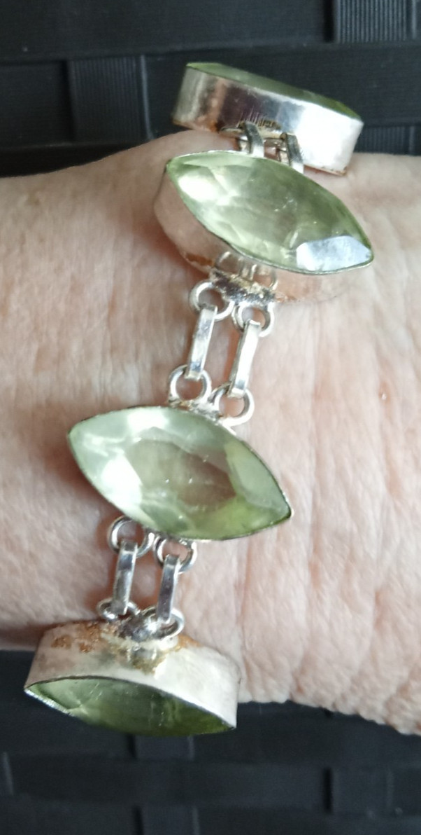 7 inch Bracelet with 5 faceted pale green stones set in silver