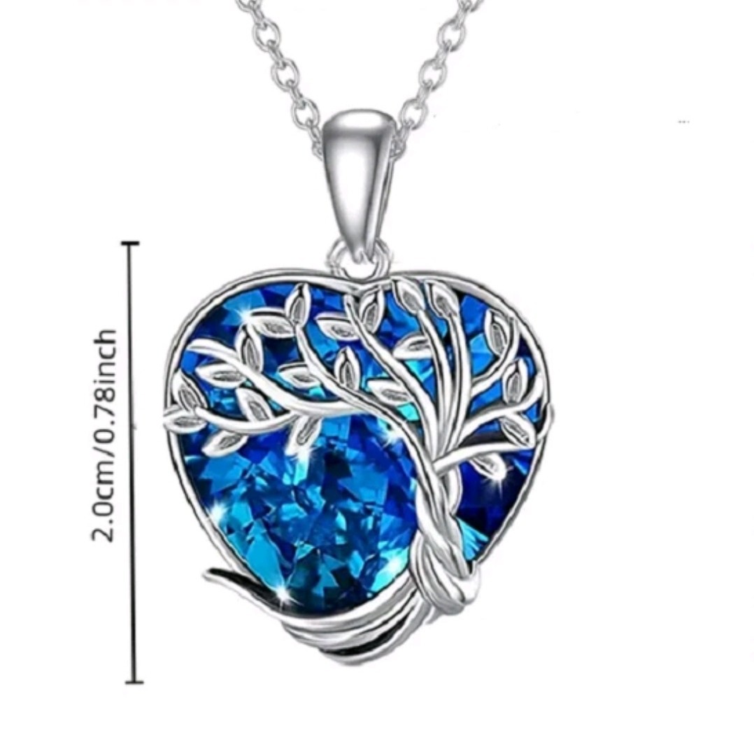 Women’s necklace with a blue crystal heart-shaped Tree of Life pendant.