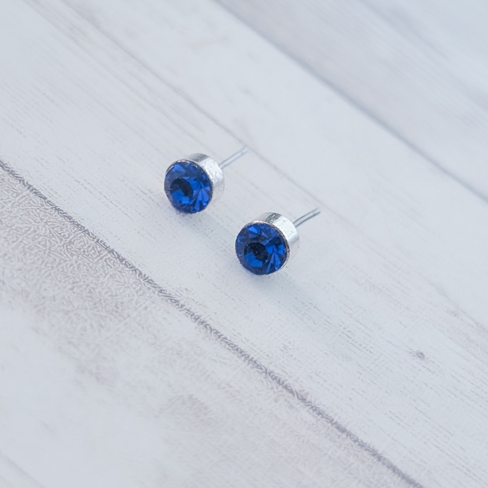 Blue Gem & Silver Tone Stud Earrings – 0.25″