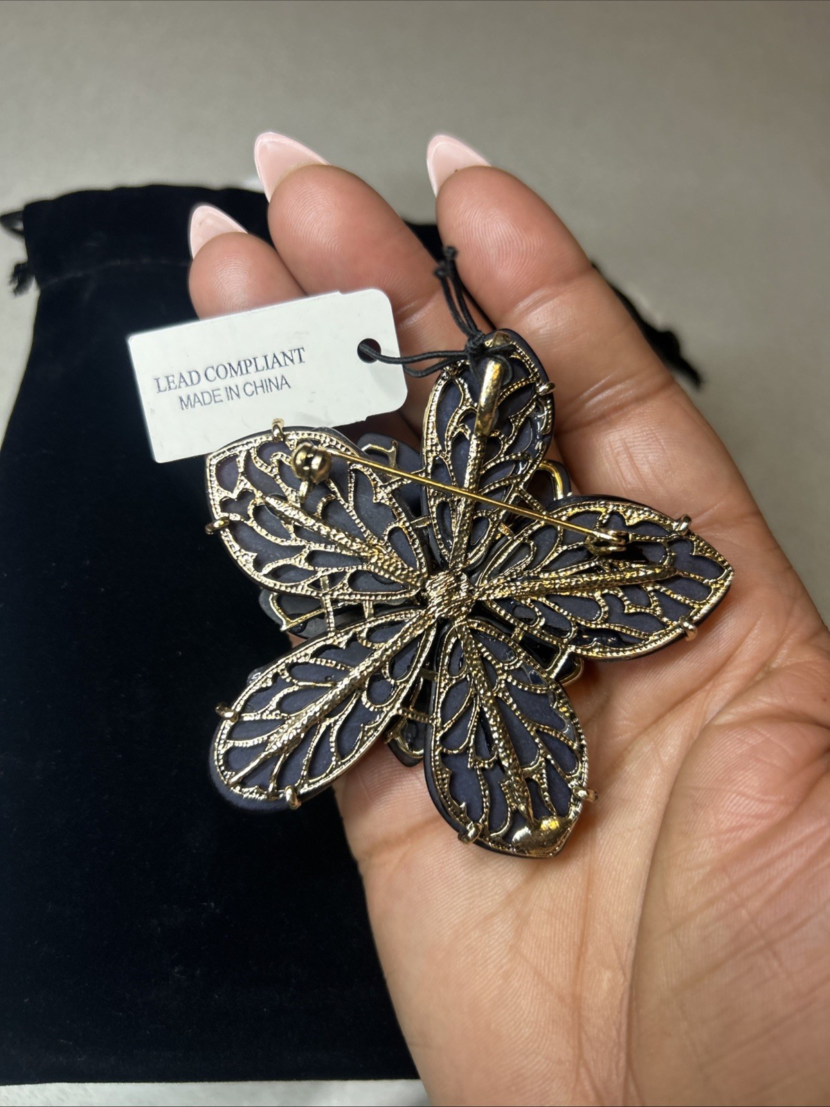 NATASHA RESIN FLOWER BROOCH WITH MULTICOLOURED RHINESTONES IN YELLOW/ BLACK