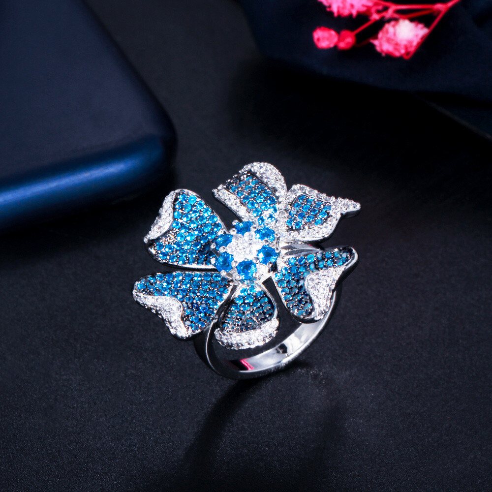 Adjustable 3D Geometric Flower Pave Setting Blue Cubic Zirconia Engagement Ring