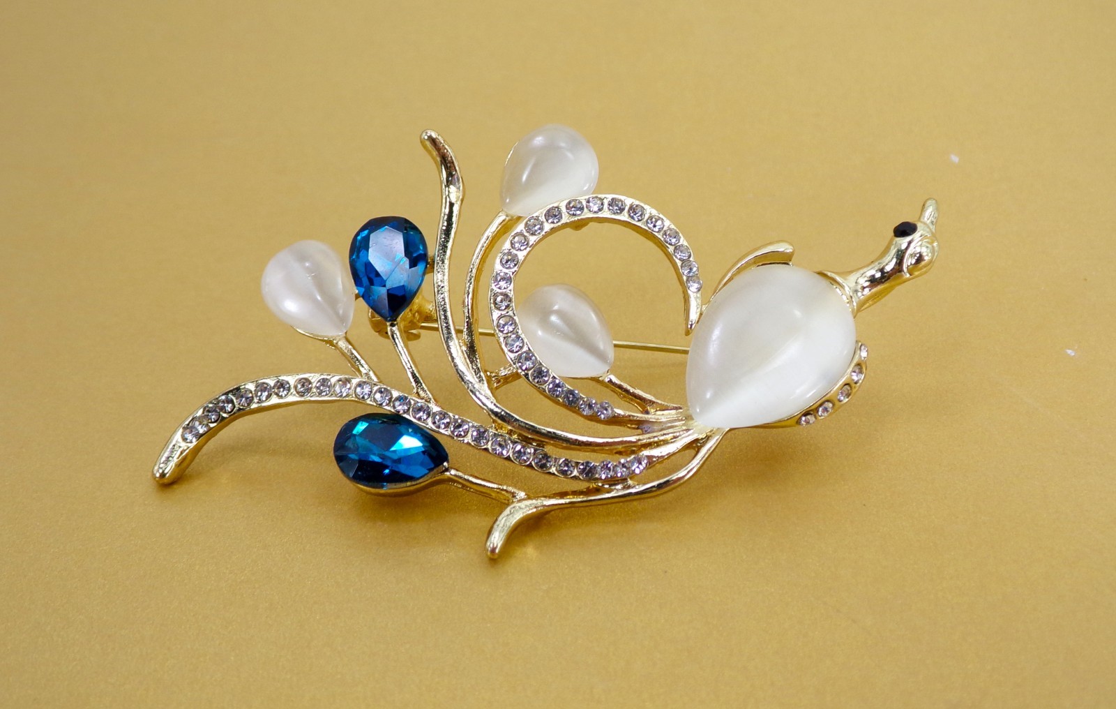 Swan Pin Brooch with white cat eye, blue and clear crystals, gold finish NEW