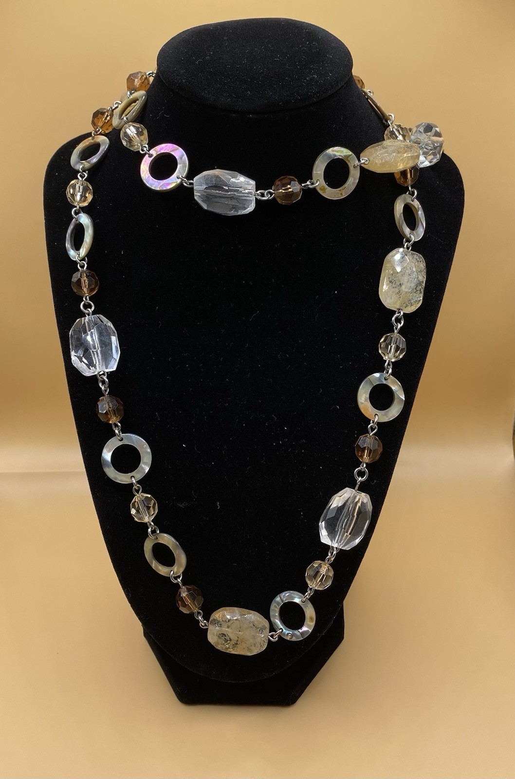 Gorgeous abalone and clear beads necklace by Lia Sophia.
