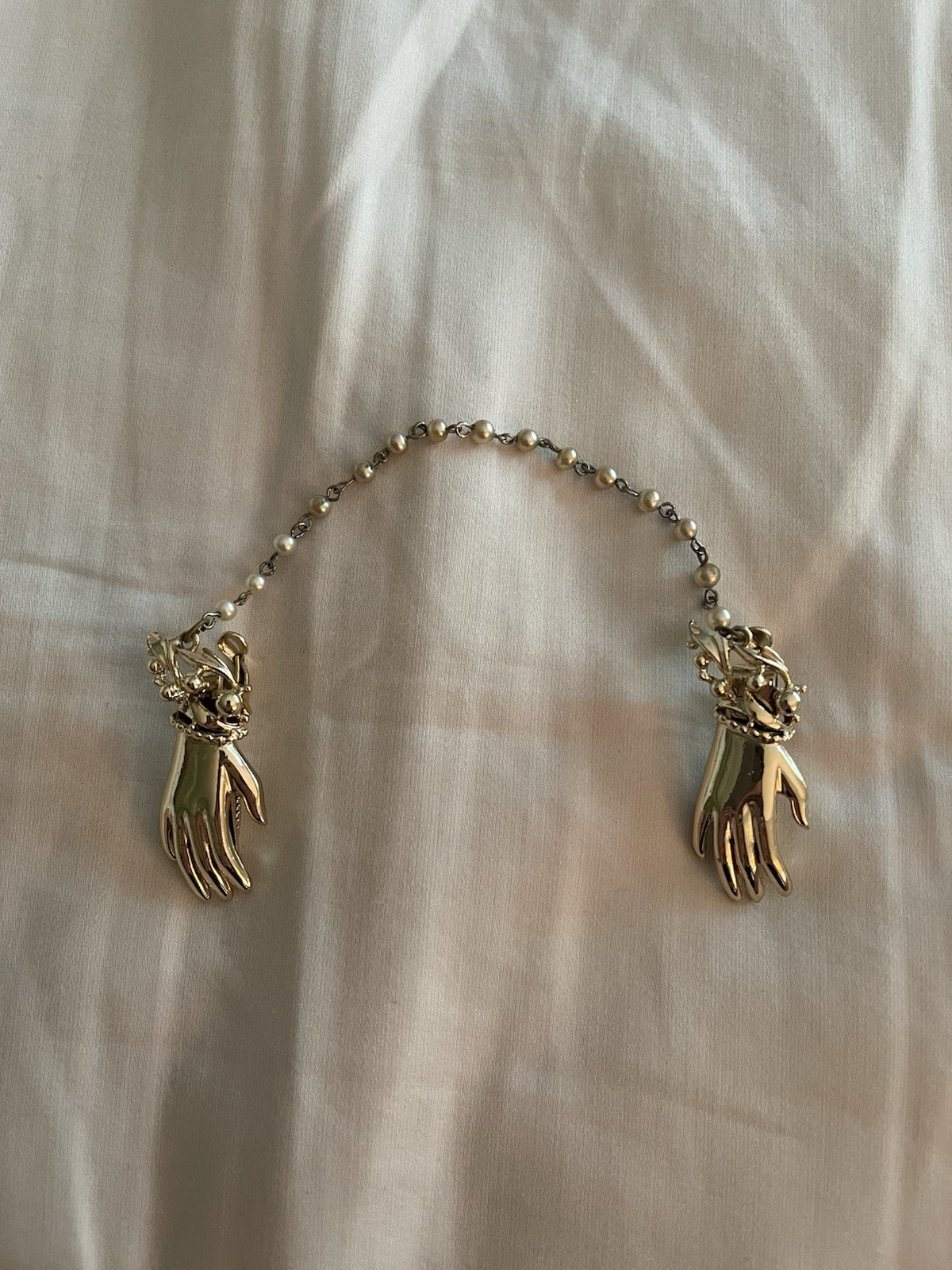 Gold Color 2 Hands With Clips Connected W/ Chain White Round Accents
