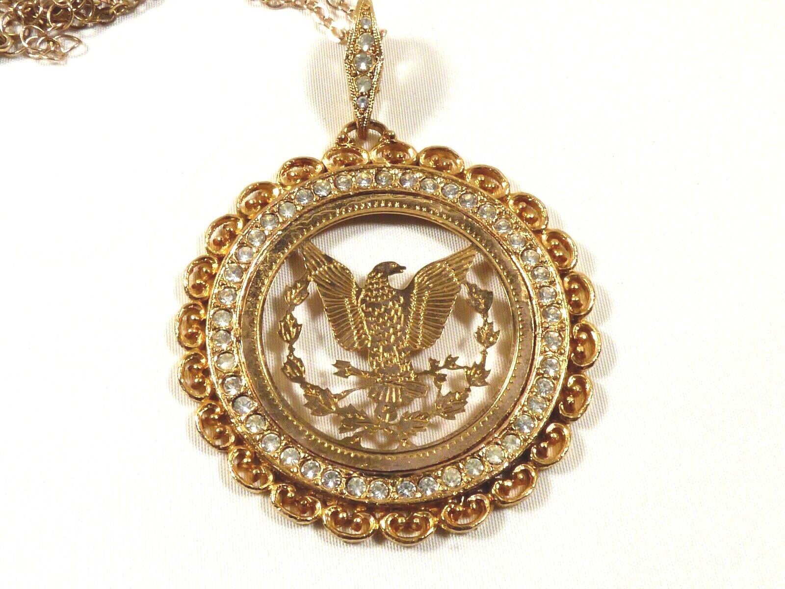 Gold Tone metal filigree Eagle Crest clear Rhinestones Pendant Necklace