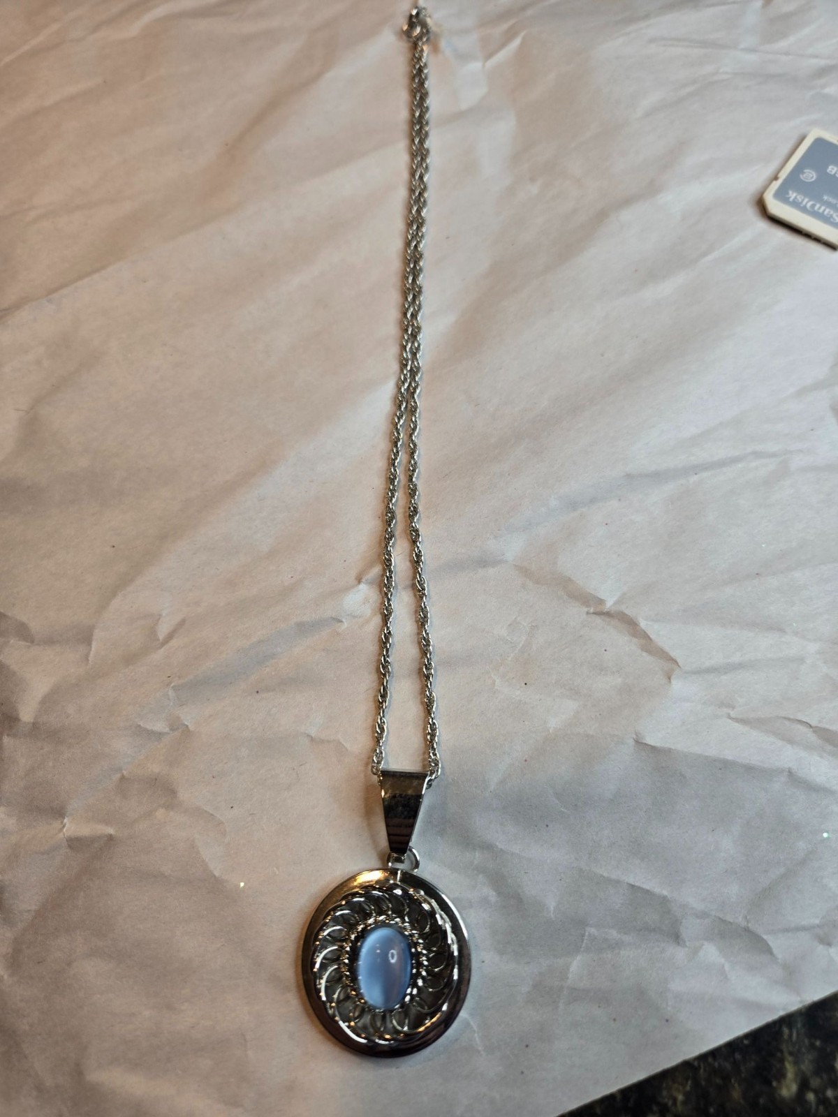Silver-Tone Chain Necklace With Circular Pendant Featuring Blue Oval Stone & Int