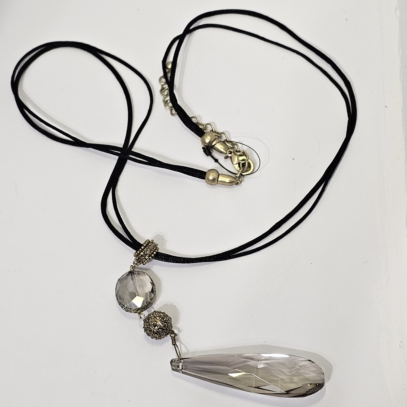 Chicos Smoky Gray Crystal Teardrop Pendant Black Cord Multi Strand Necklace Gold