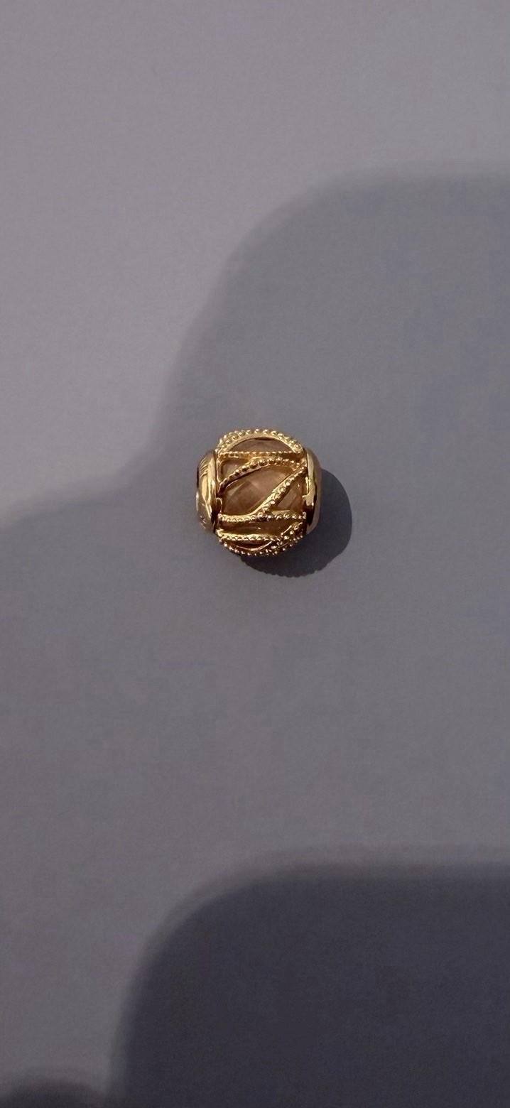 Pandora rose gold pink loop design charm.