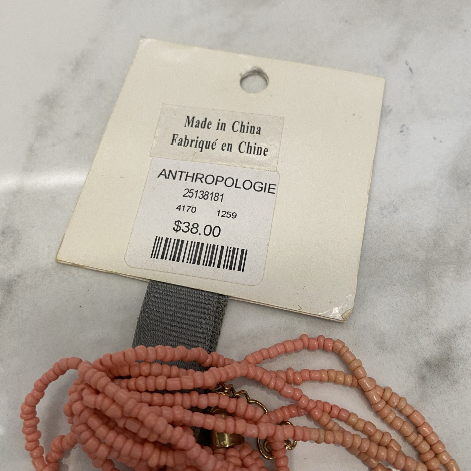 New Seed Bead Necklace by Anthropologie salmon pink gold NWT $38. Multi Strand