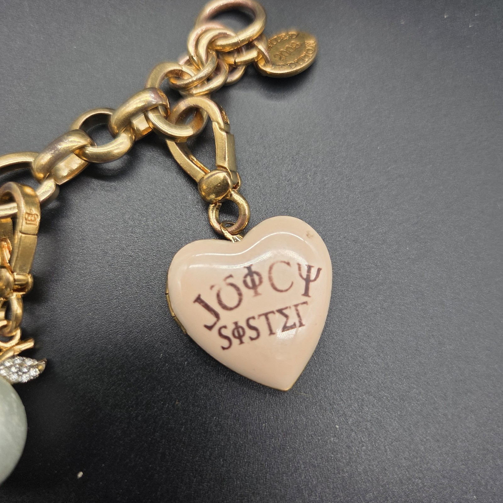 Juicy Couture Gold Tone Signed Enamel Heart Dangle Charm Bracelet 7 1/2 inch