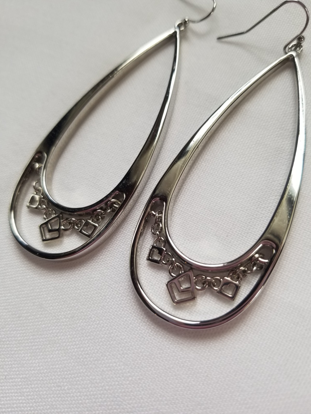 Jessica Simpson Long Teardrop Silver Earrings with Chevron Geometric Chain